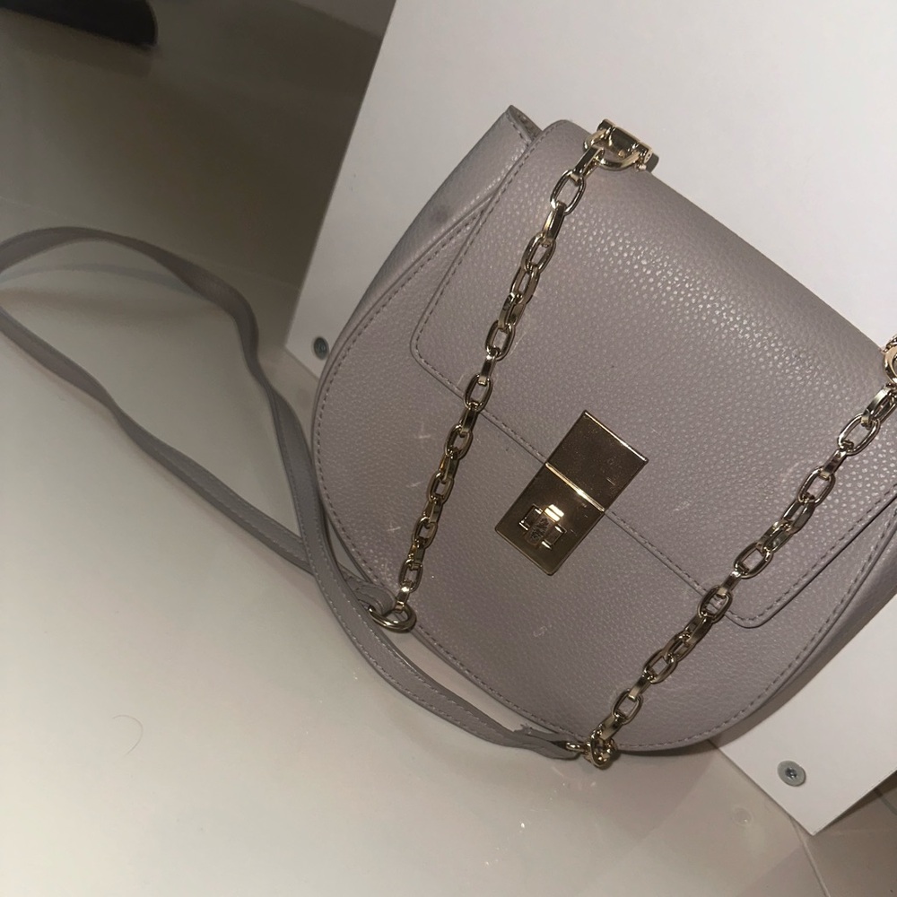 Grey with gold accessory